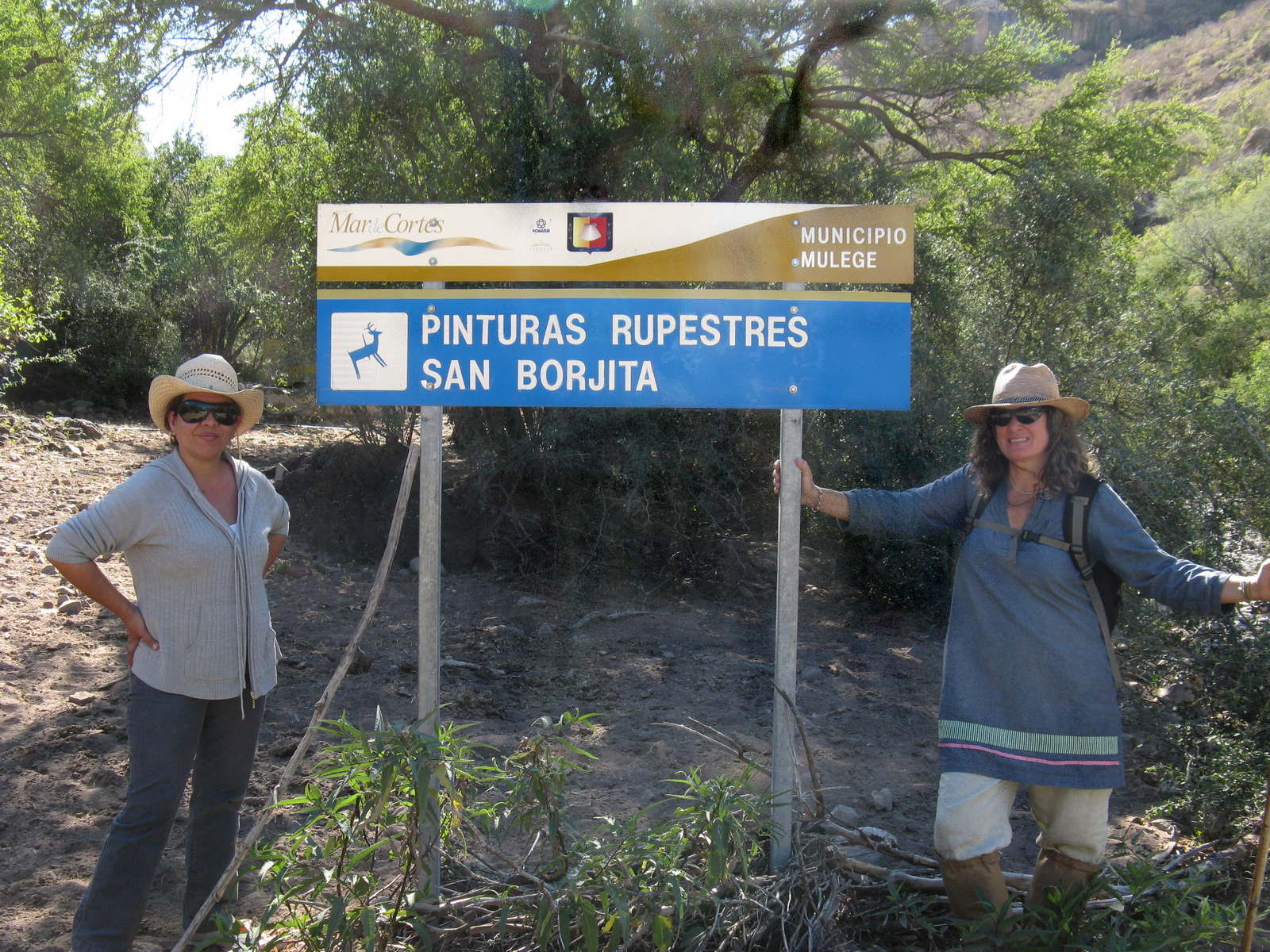 Maria (left) and Sheila at the INAH sign for the site.